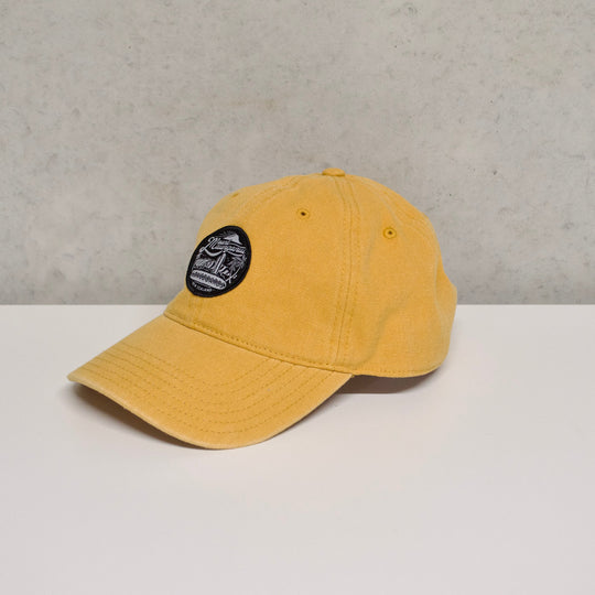 Retro Badge Cap in mustard canvas with MLB custom badge and pre-curved peak.