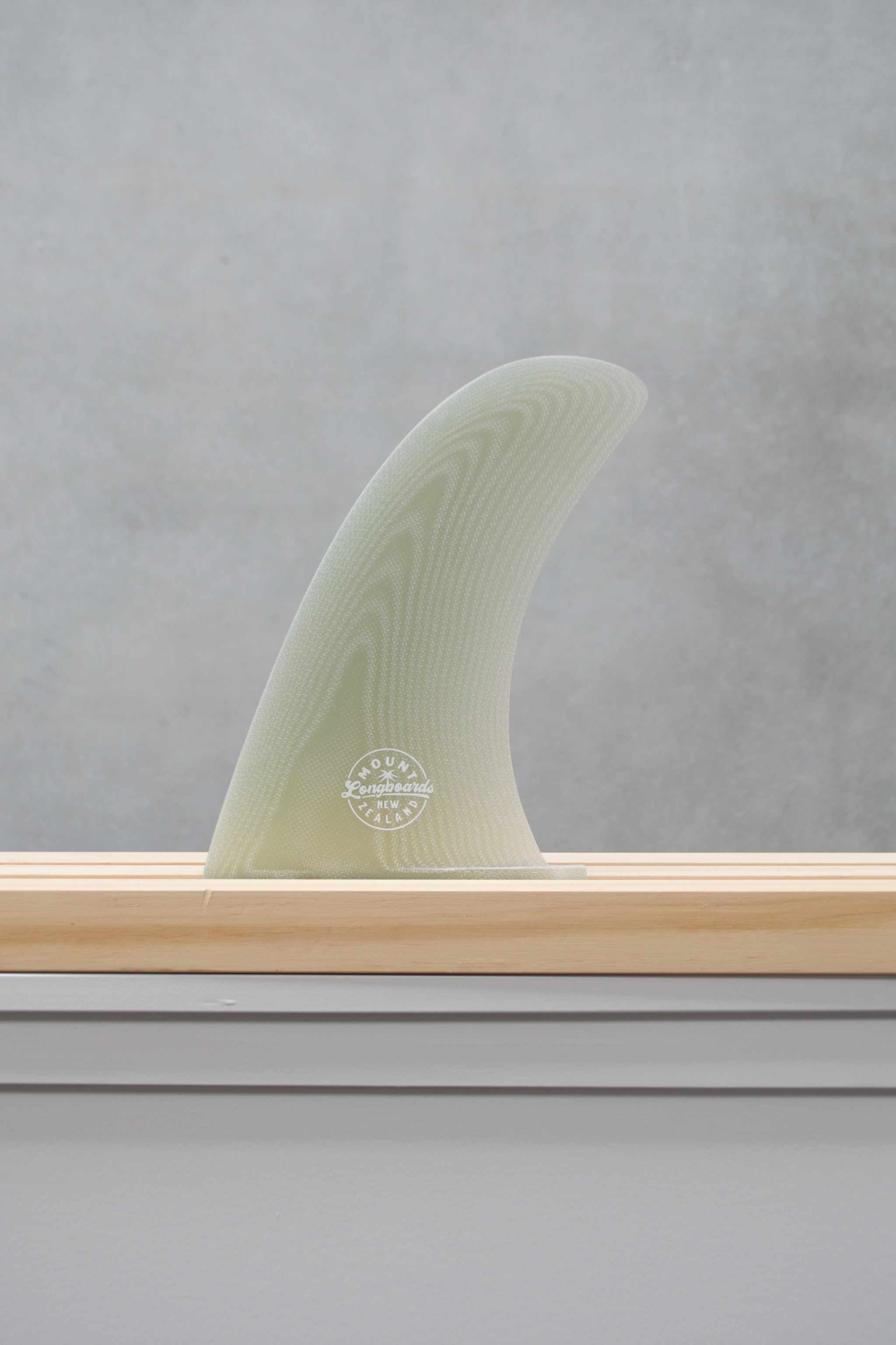 Optic Fibre Pivot longboard fin with layered effect and cosmic vibes.