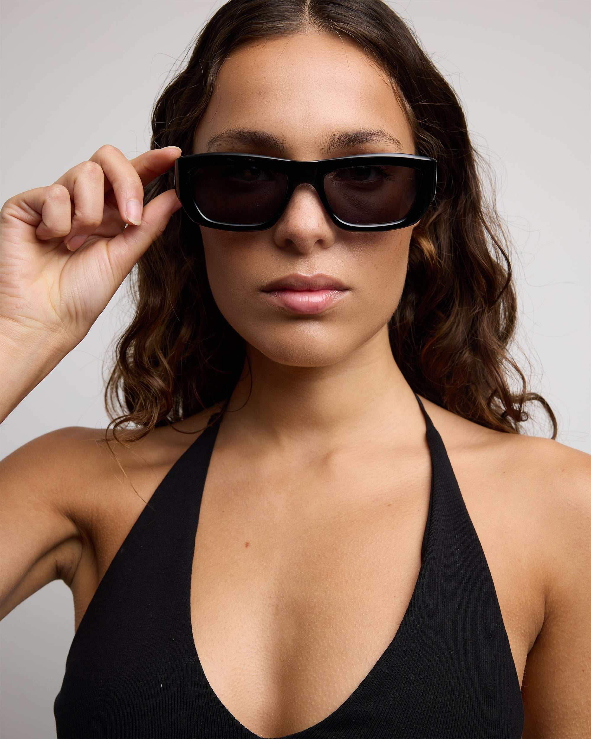 Szade - Spence sunglasses with black rectangular frames and polarized ink black lenses.