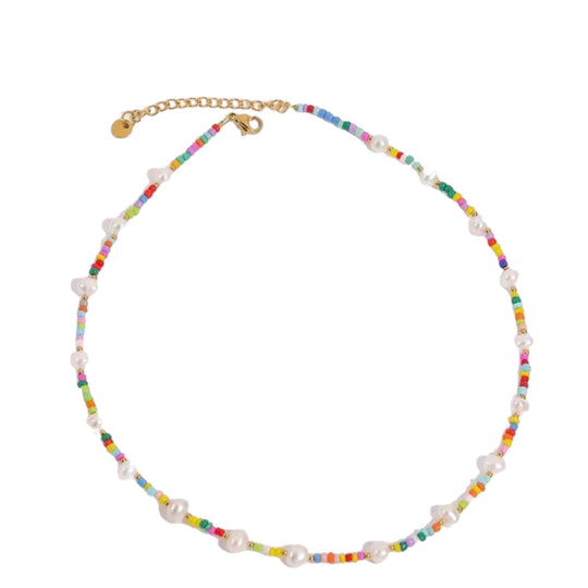 Boho-inspired Beache Necklace with freshwater pearls and glass beads, versatile for day and night wear.